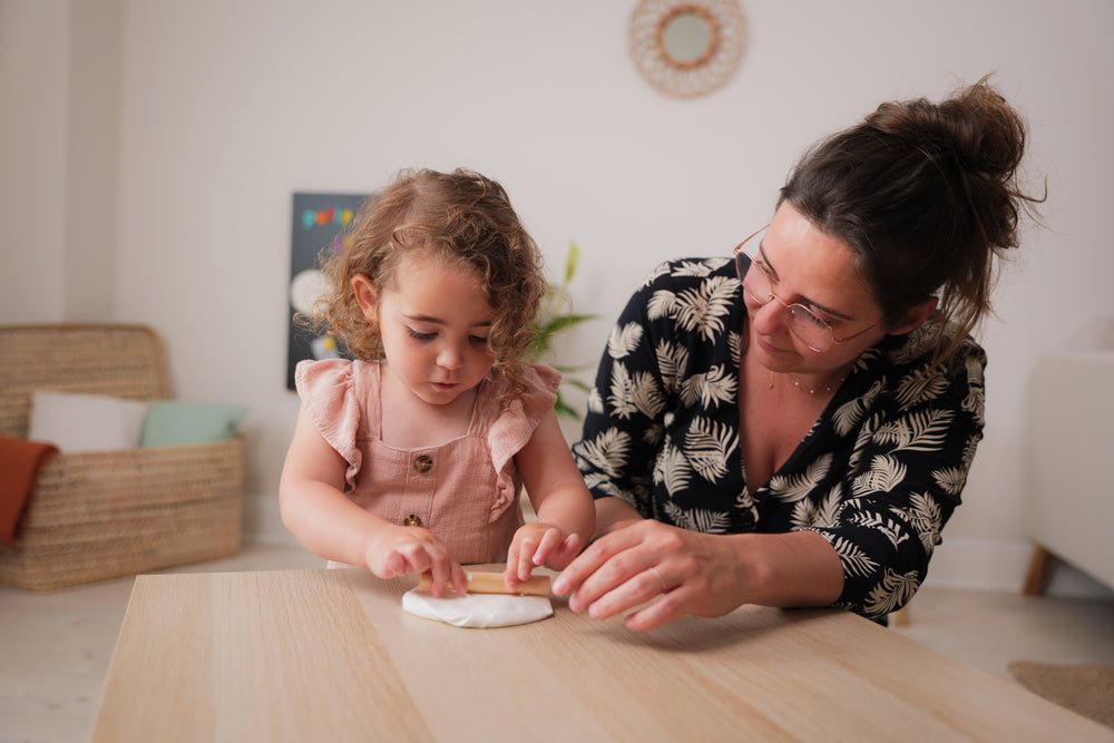 Mother and daughter in a DIY activity with 2 magnetic keepsakes, perfect  gift to treasure birth souvenirs.