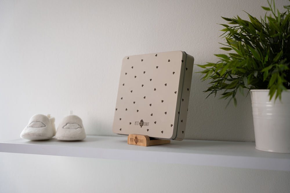 The Baby Box Square - Pretty Hearts fits seamlessly into your nursery decor or living room.