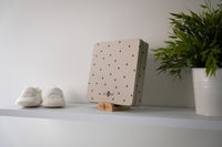 The Baby Box Square - Pretty Hearts fits seamlessly into your nursery decor or living room.
