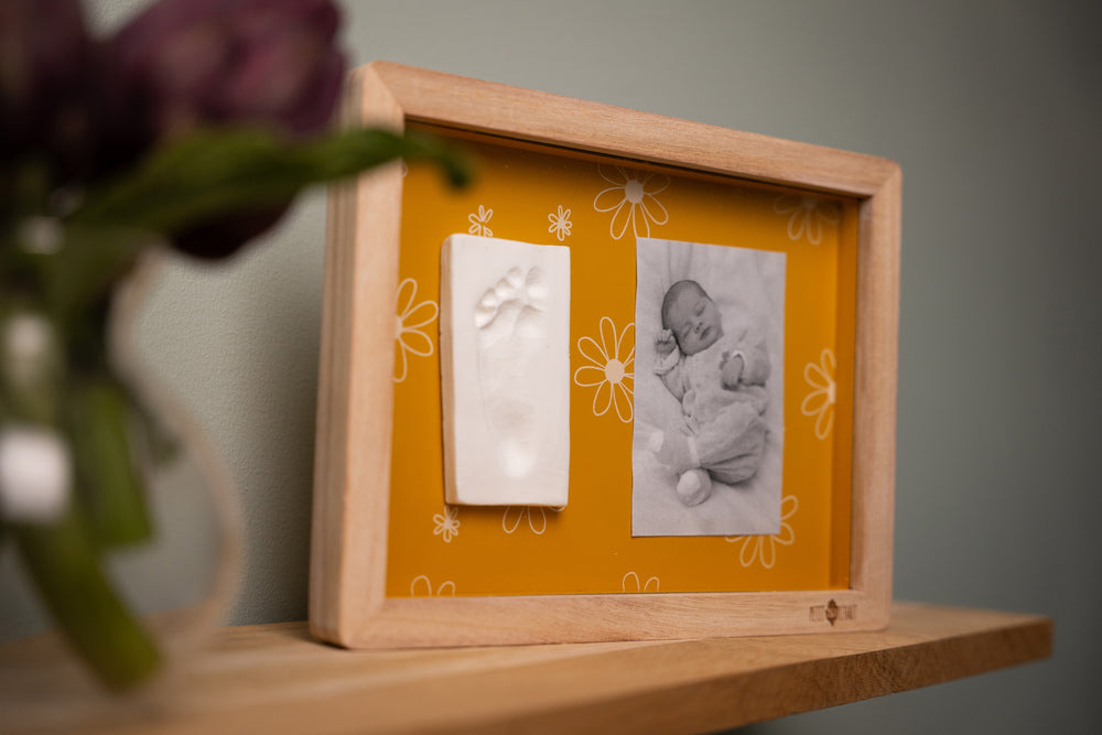 The Classic Frame Daisy Ochre is a Timeless Baby Keepsake.