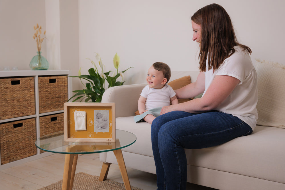 Display a beautiful photo and create a lasting baby footprint or handprint using this timeless newborn keepsake box.