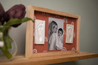 Designed with generous space, the newborn 2 Prints Frame - Rainbow Terracotta is ideal for twins.